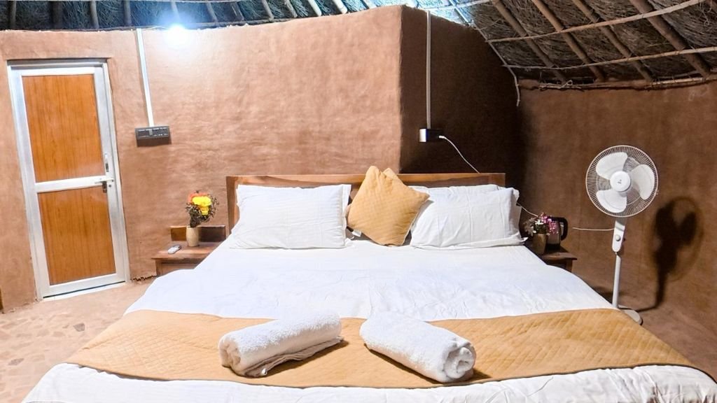 Non-AC luxury tent room with traditional decor at Royal Sun Desert Camp